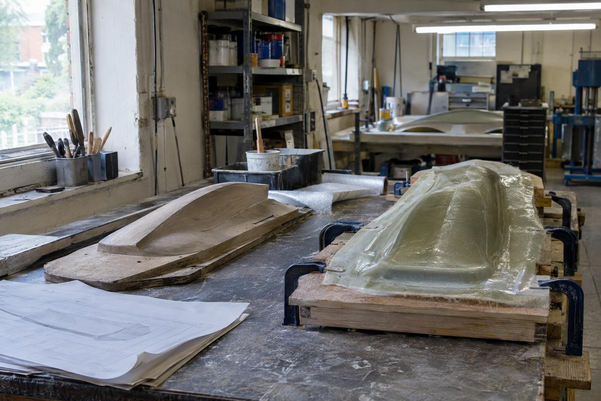 Original pattern and new replacement mould being rebuilt in workshop