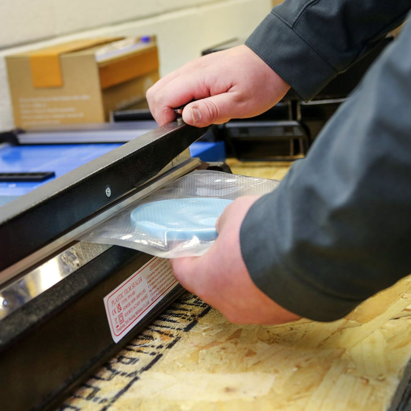 Heat sealing packaged parts at TCI
